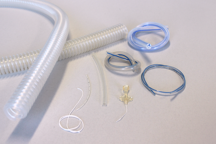 Seven samples of medical hoses from ventilation hose to very thin catheter hose
