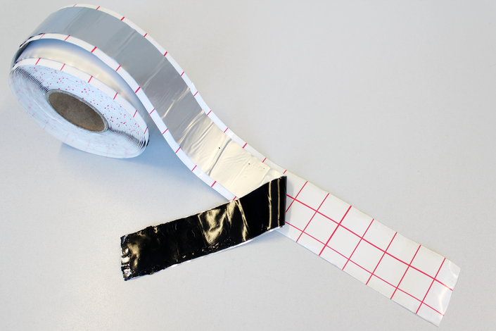 A roll of butyl adhesive tape